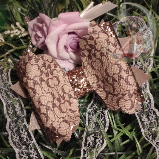 Double C designer bow with glitter