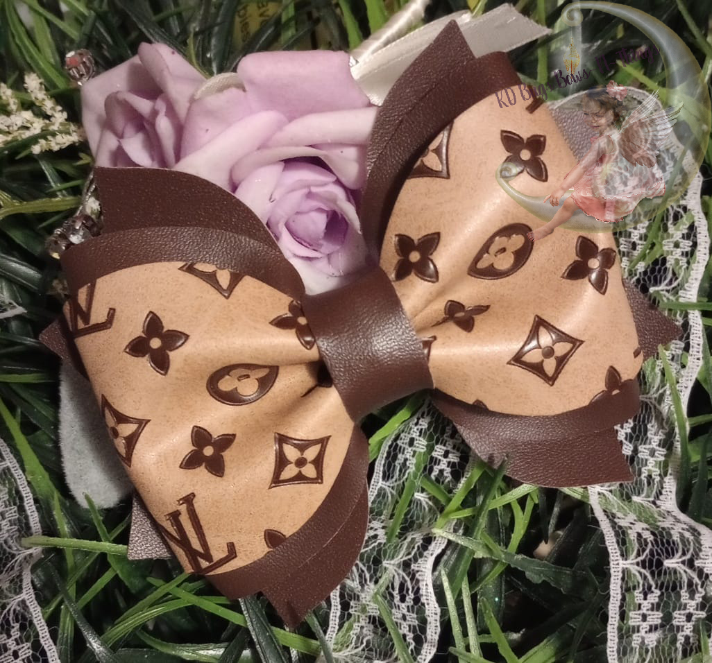 Brown purse colored designer bow